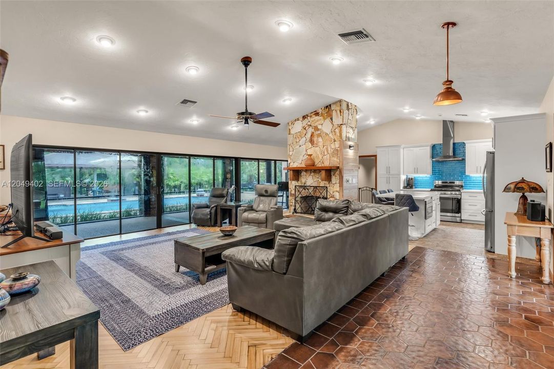 LIVING ROOM WITH WOOD BURNING FIREPLACE