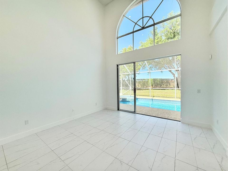 Family room overlooking pool