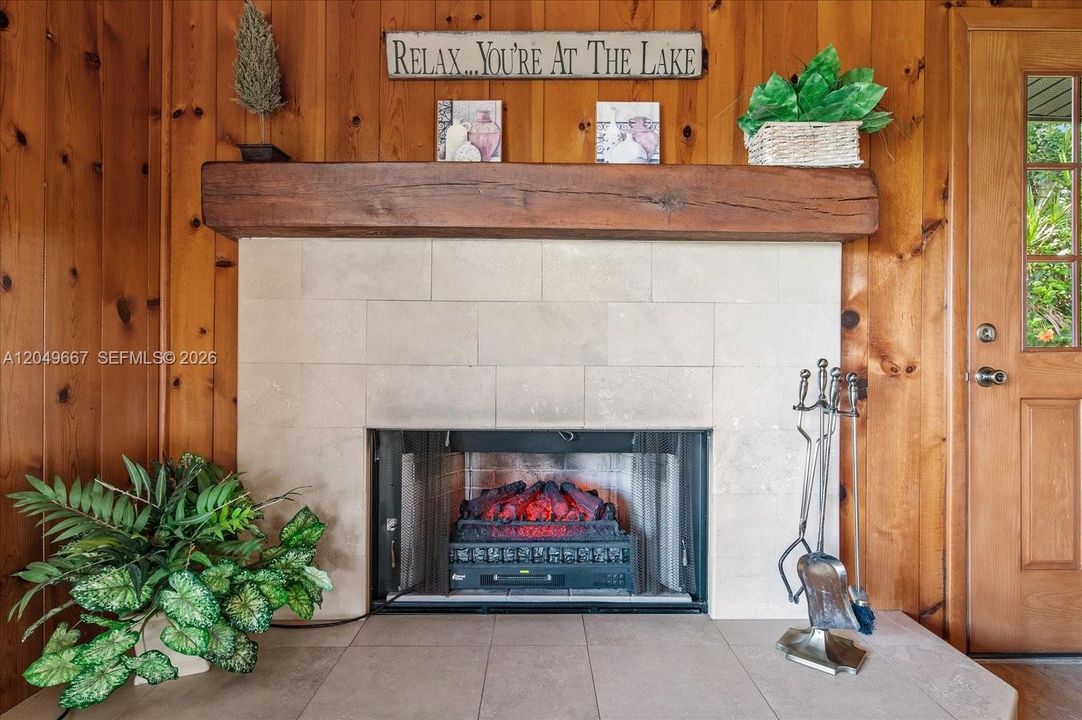 Electric fireplace with heat and various light settings