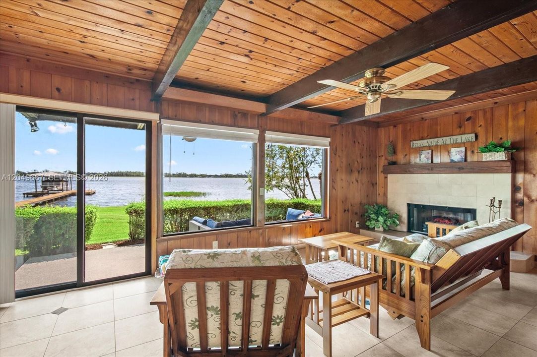 Picture windows (impact) overlooking wide lake
