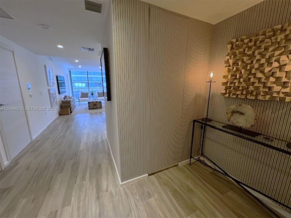 Entry-hallway to Living/Dining/Kitchen Area