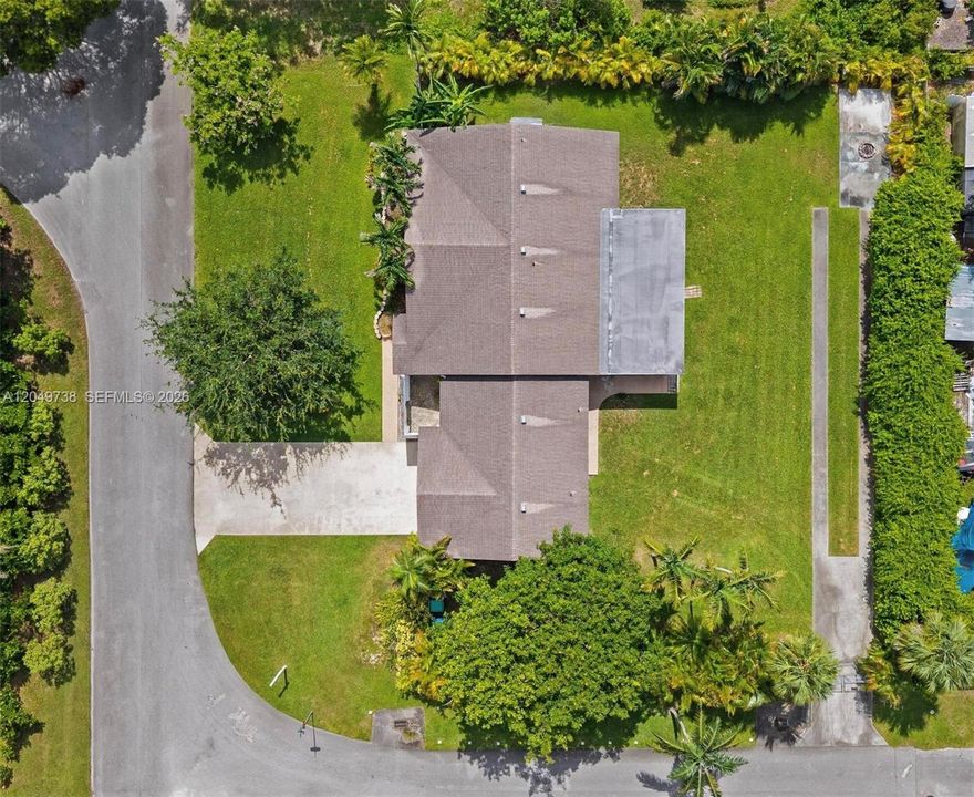 Large 15,000 sf ft corner lot with 2 driveway access!