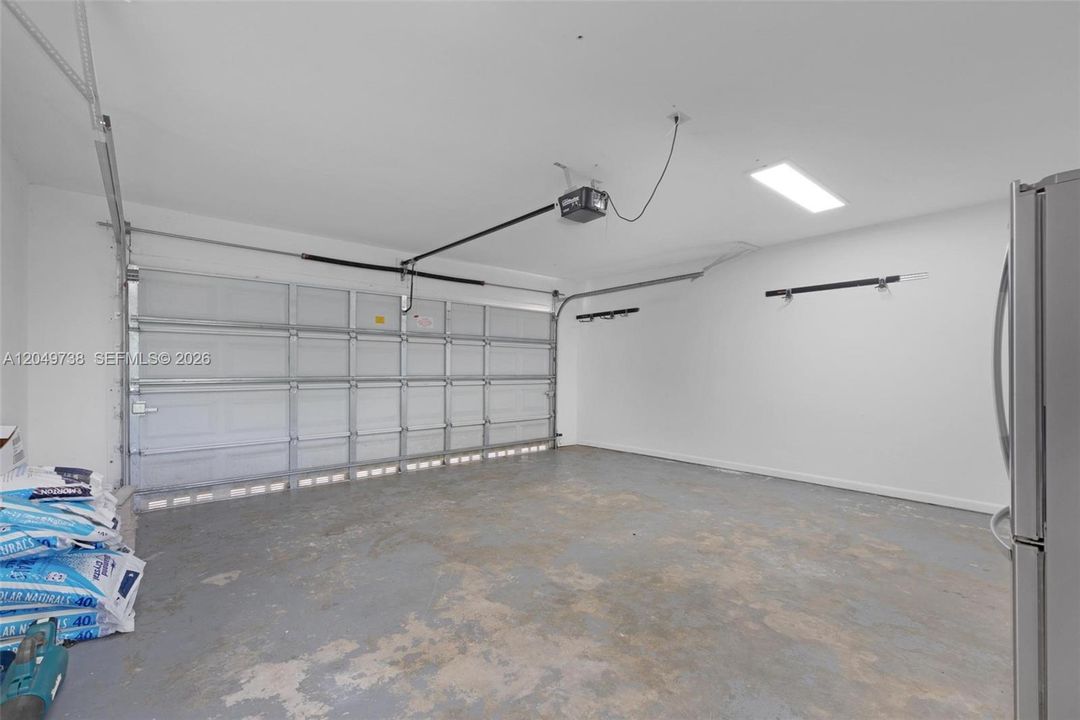 Spacious garage with side door