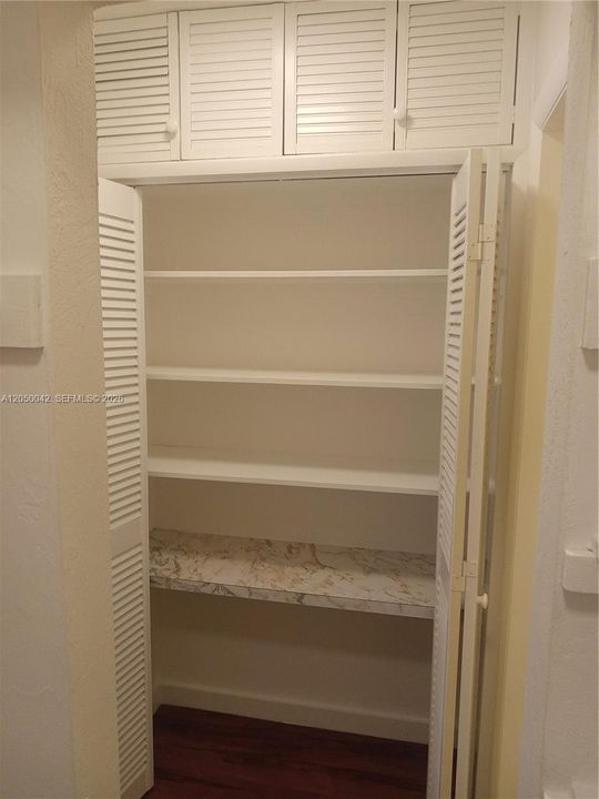 extra shelving in master closet