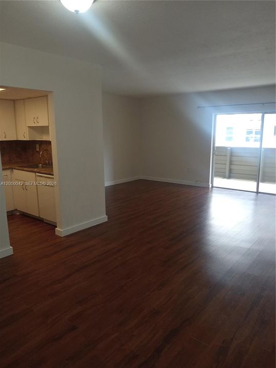 living room, dining area, into kitchen