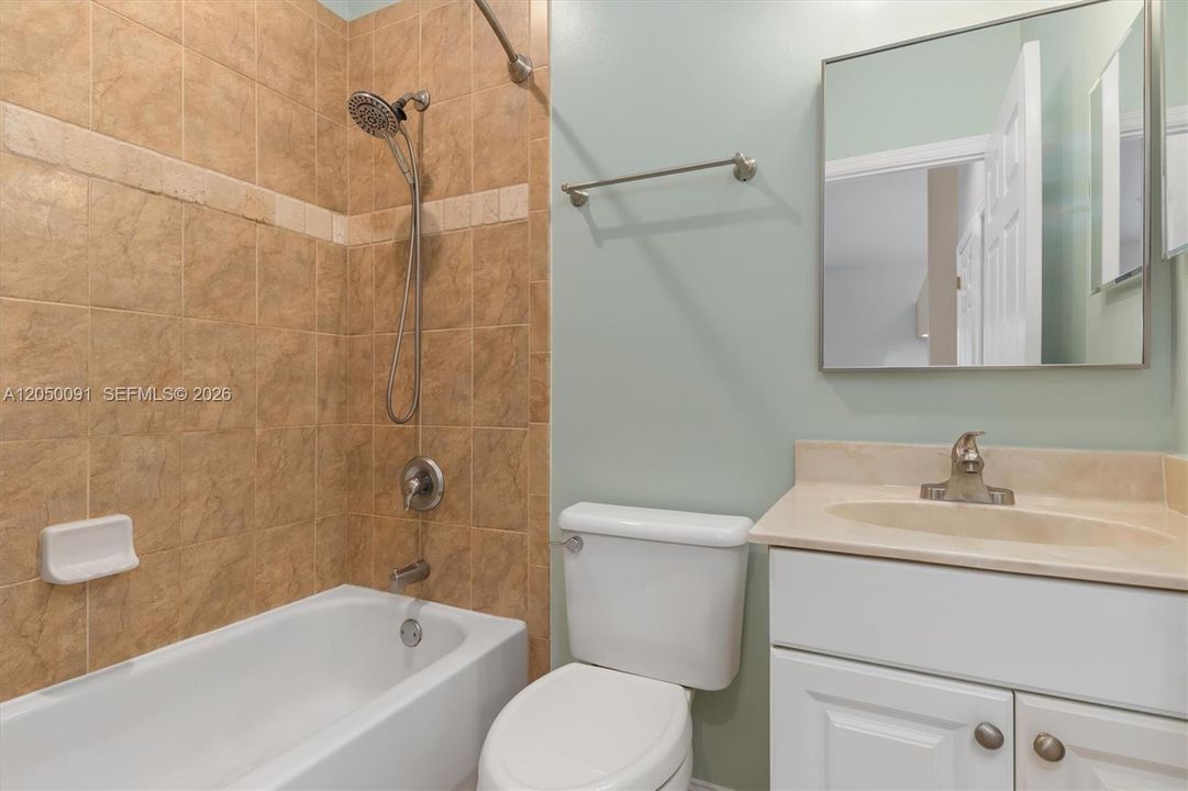 Bathroom #2 has shower tub combo