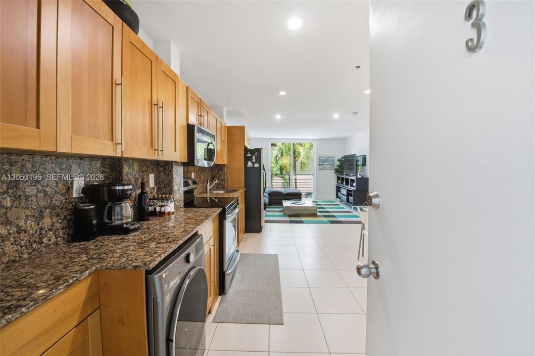 Kitchen including washer & dryer
