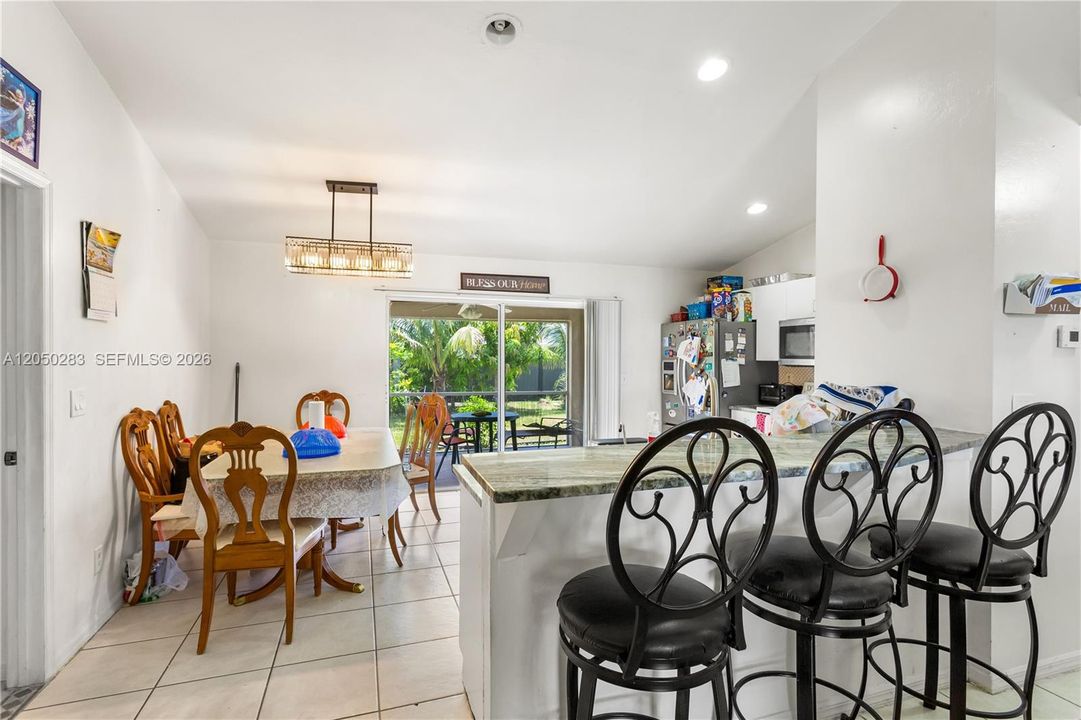 The SPACIOUS KITCHEN is designed with function and style in mind, offering plenty of GRANITE COUNTER SPACE, cabinets, a pantry
