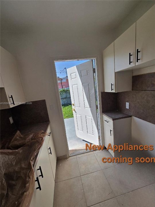 Stainless Steel appliances (range, refrigerator,range hood