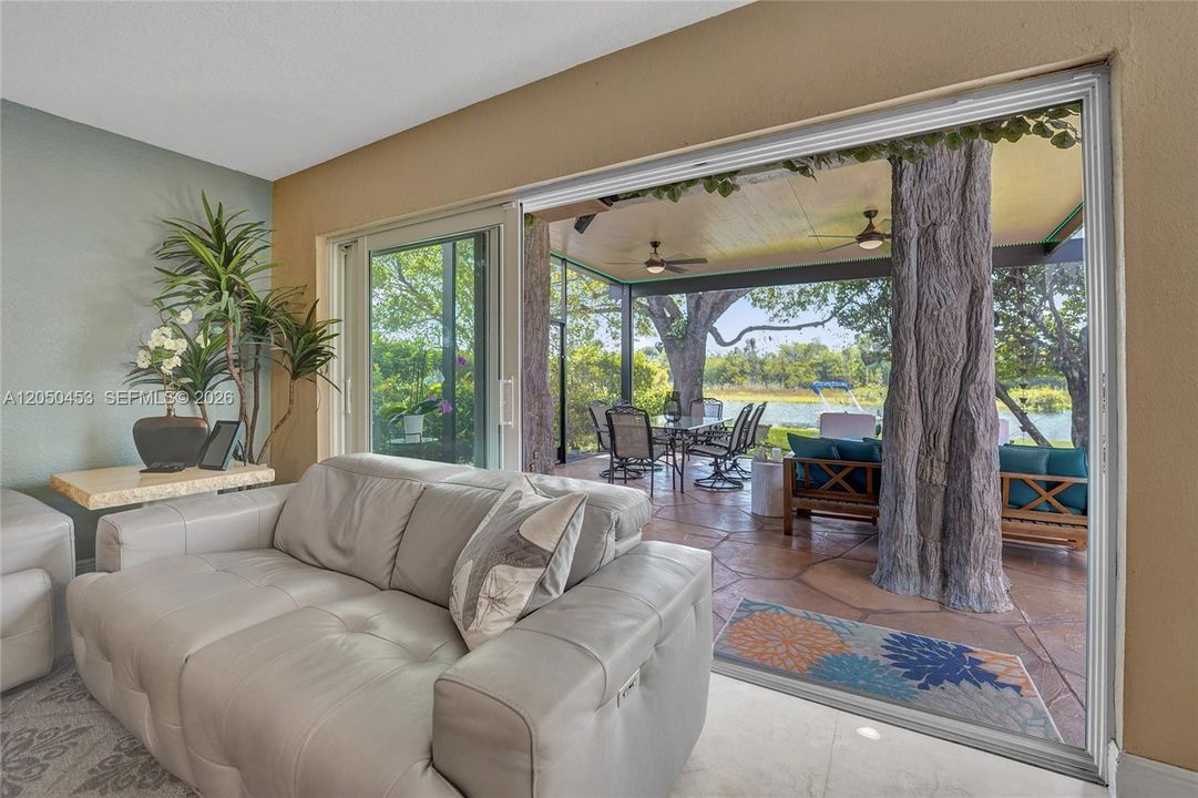 THE SLIDING DOORS OPEN TO THE PATIO!