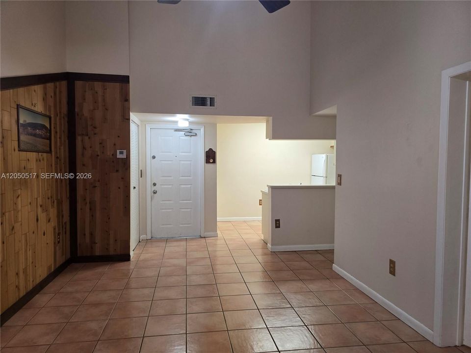 Living area view to kitchen