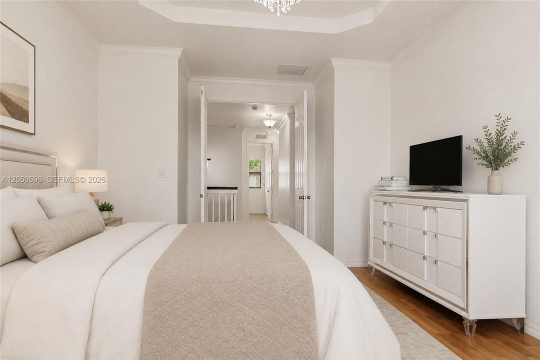 Virtually staged , view of double doors for privacy for the master bedroom