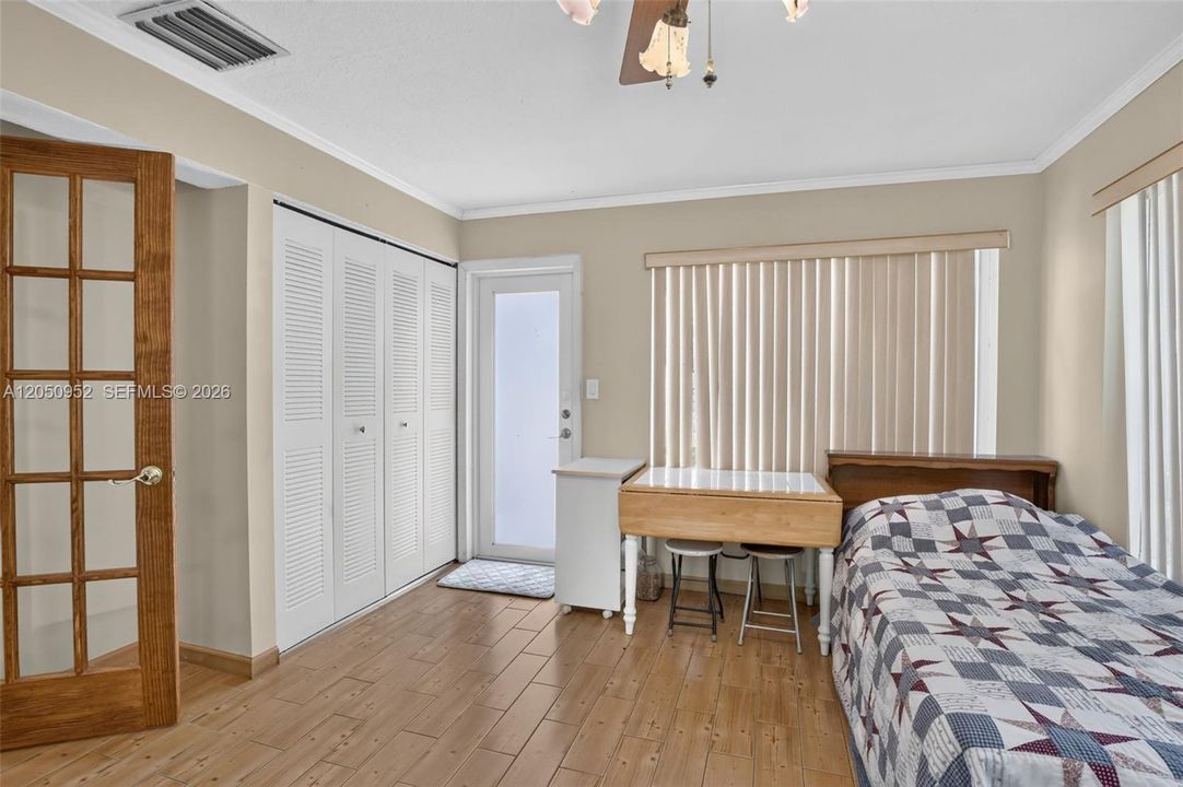 Family room set up as the 4th bedroom