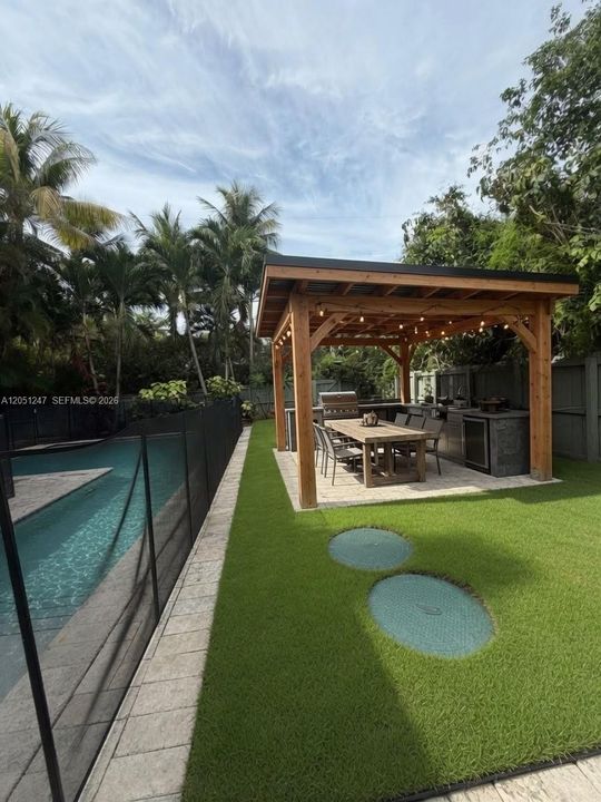 VIRTUALLY RENOVATED WITH COVERED PATIO