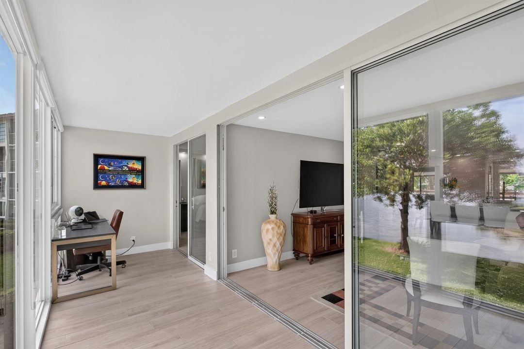 GLASS ENCLOSED FLORIDA ROOM