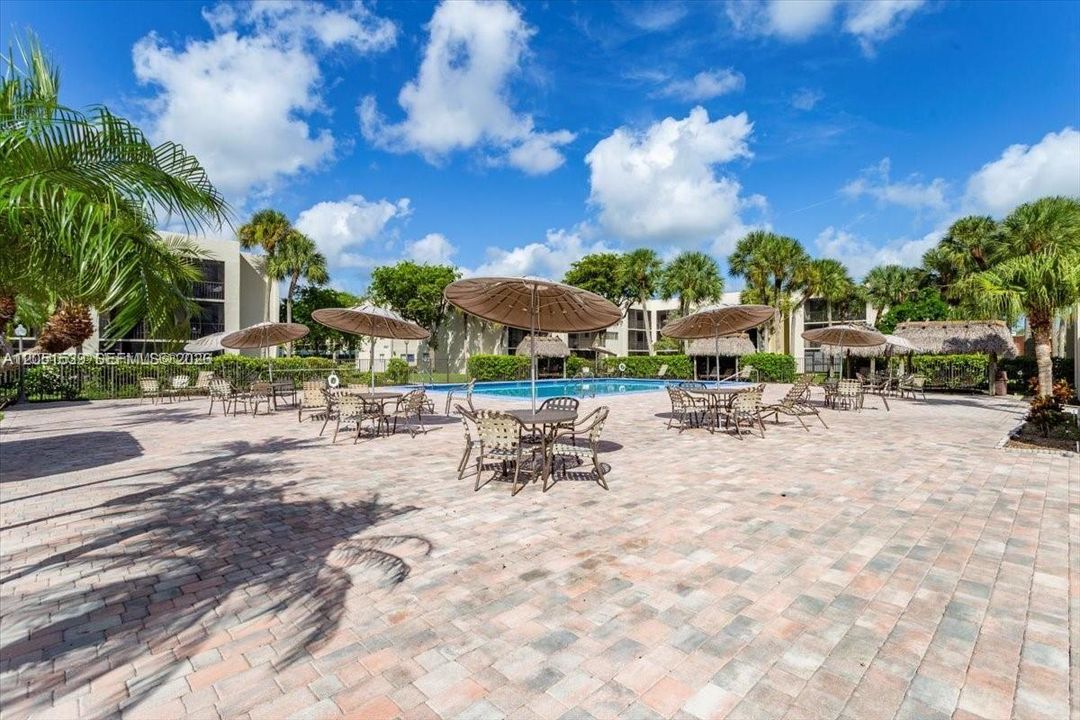 MAIN POOL WITH LOVELY SITTING AREAS