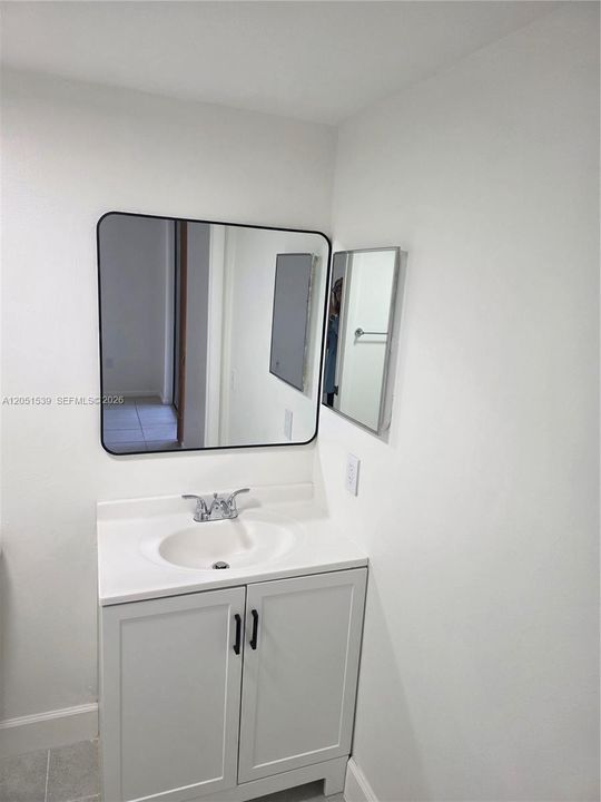 MASTER BATH WITH NEW CABIBET & MIRROR