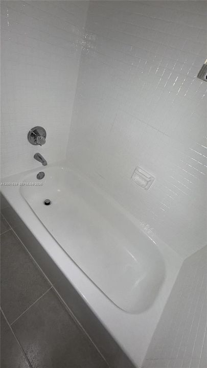 HALL BATH HAS TUB