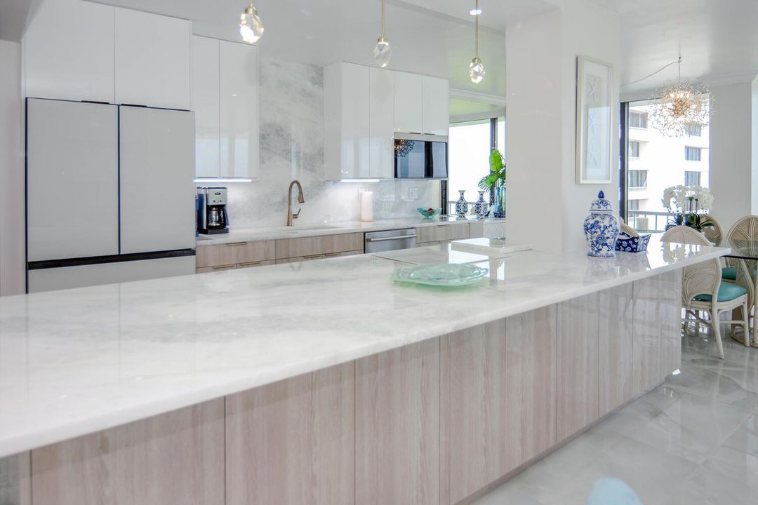 Quartz Countertops & Marble Floors