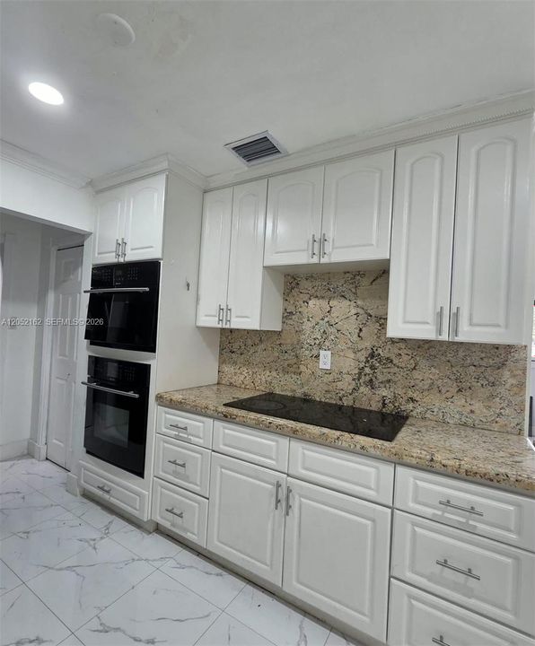 one side of the kitchen