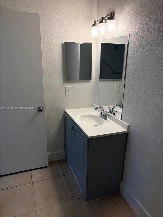 New vanity, new mirror, new medicine cabinet, new mirror