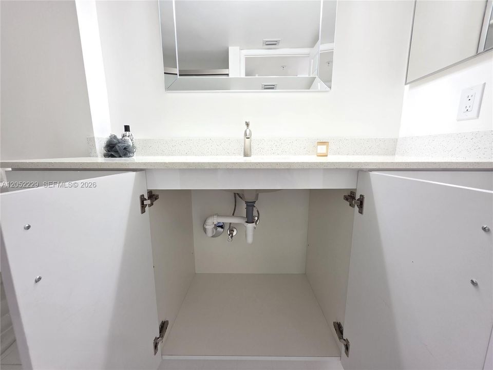 NEW QUARTZ TOP AND CABINETS