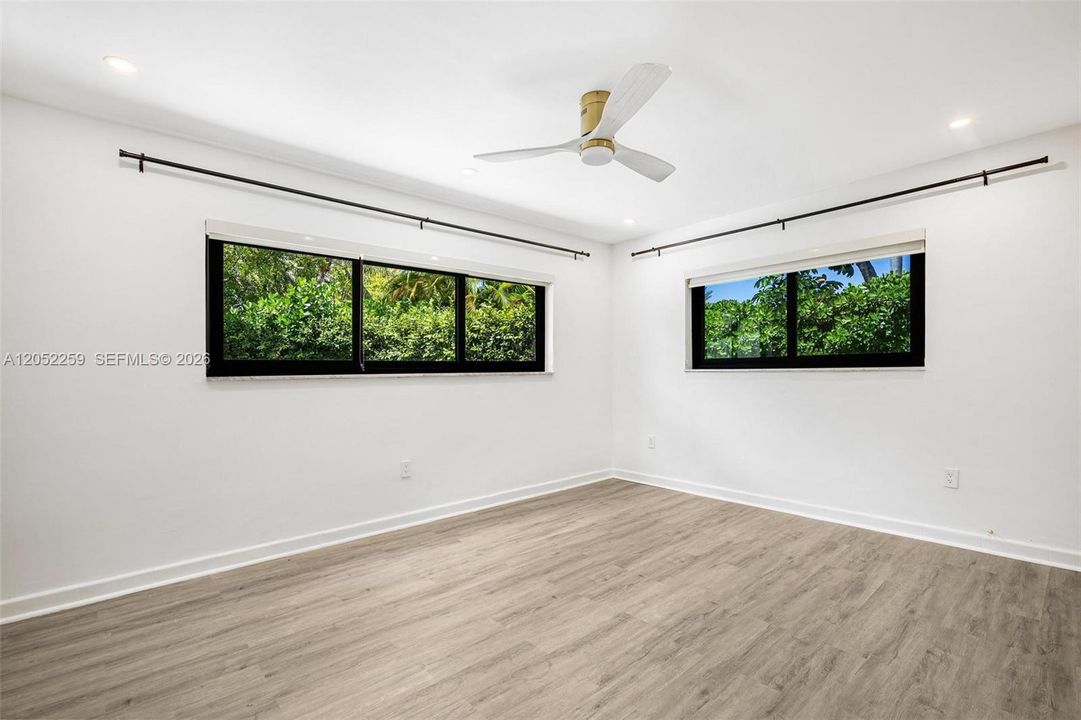 First-floor bedroom pool side