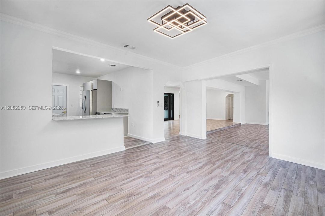 Dining area connected to the main living spaces and open-concept kitchen