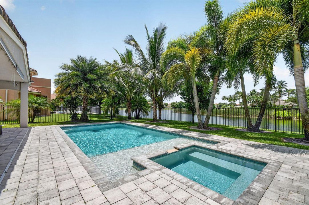 Backyard with pool and hot tub