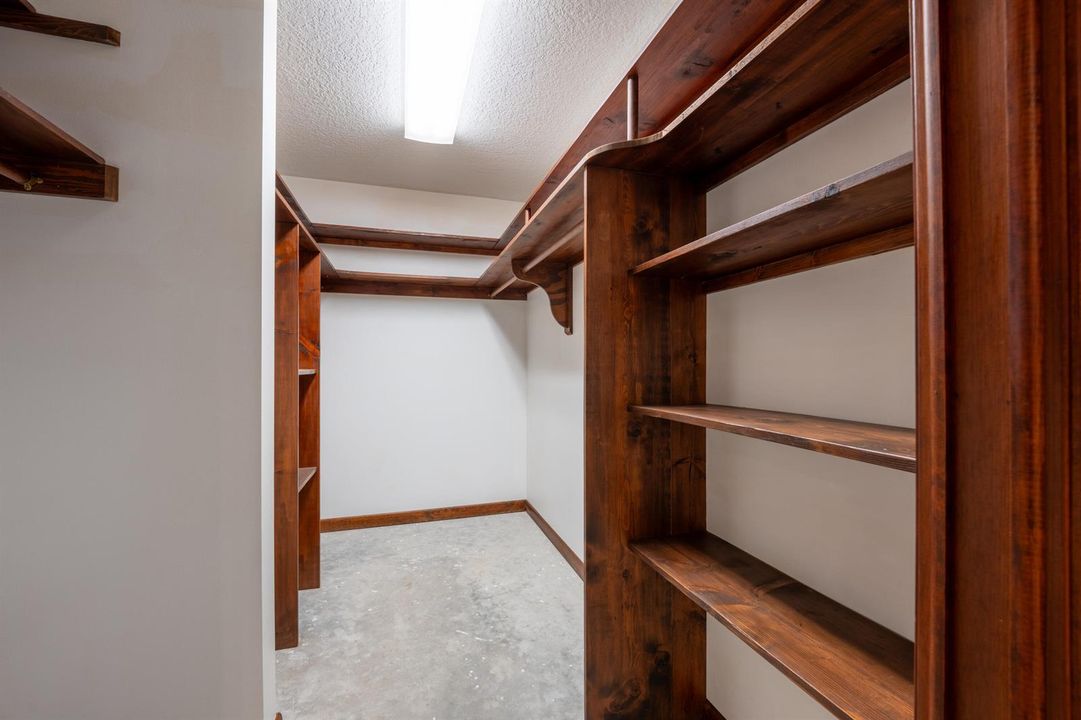 Primary Bedroom walk in closet 1