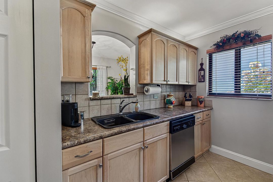 Kitchen opening into Dining Room
