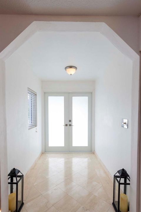 Main entrance impact door