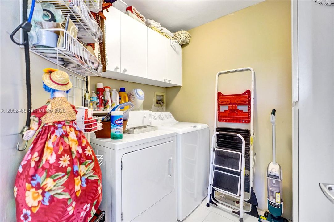 Spacious laundry and storage.