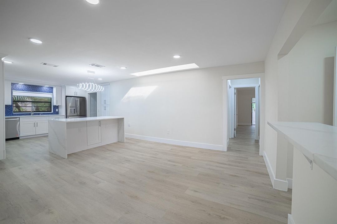 dining area space with a skylight
