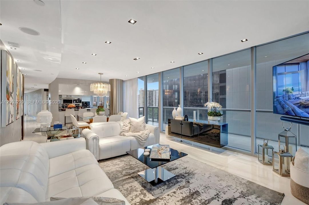 Spacious Living Room Overlooking the Dining Area and Kitchen
