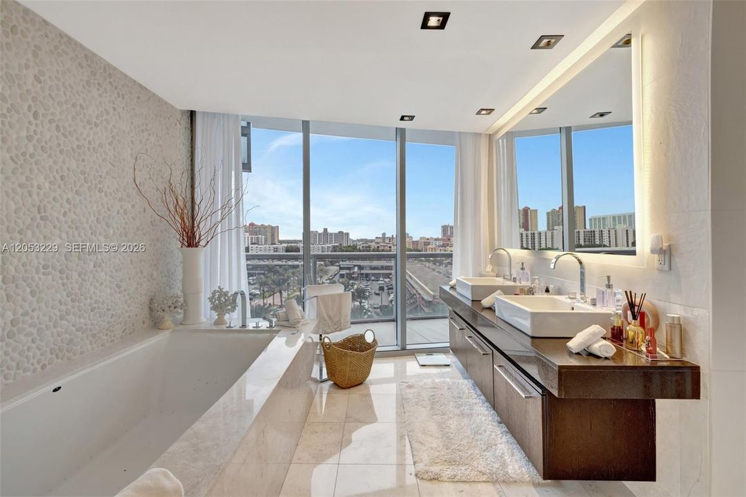 Private Main Bathroom Featuring a Double Vanity