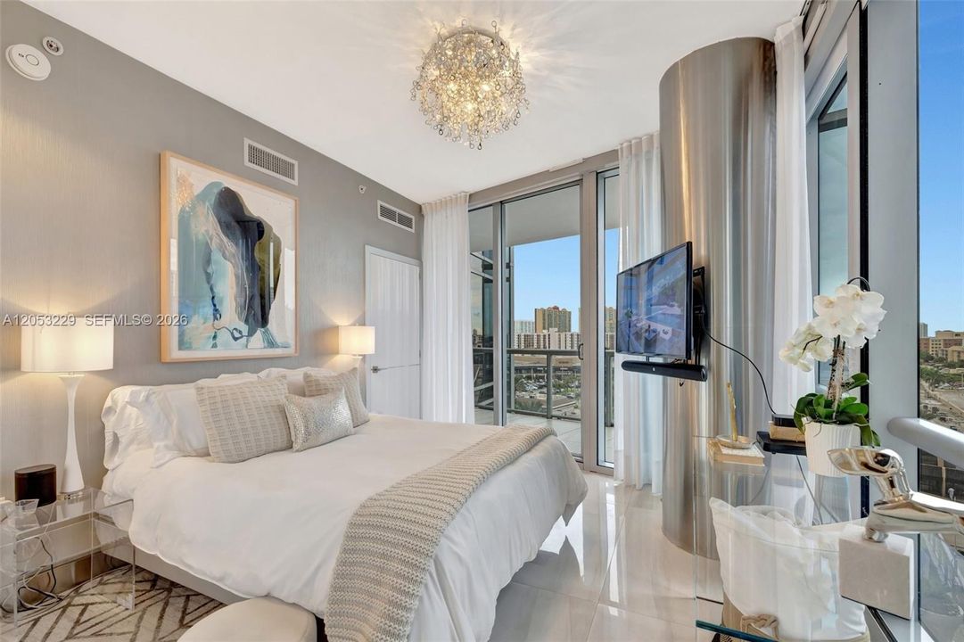 First Bedroom Featuring City Views and Its Own Full Bathroom