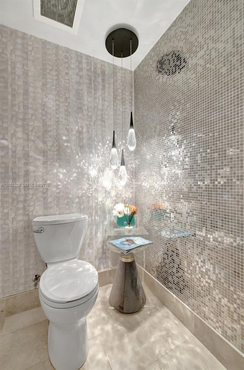 Guest Powder Room Near the Kitchen and Foyer