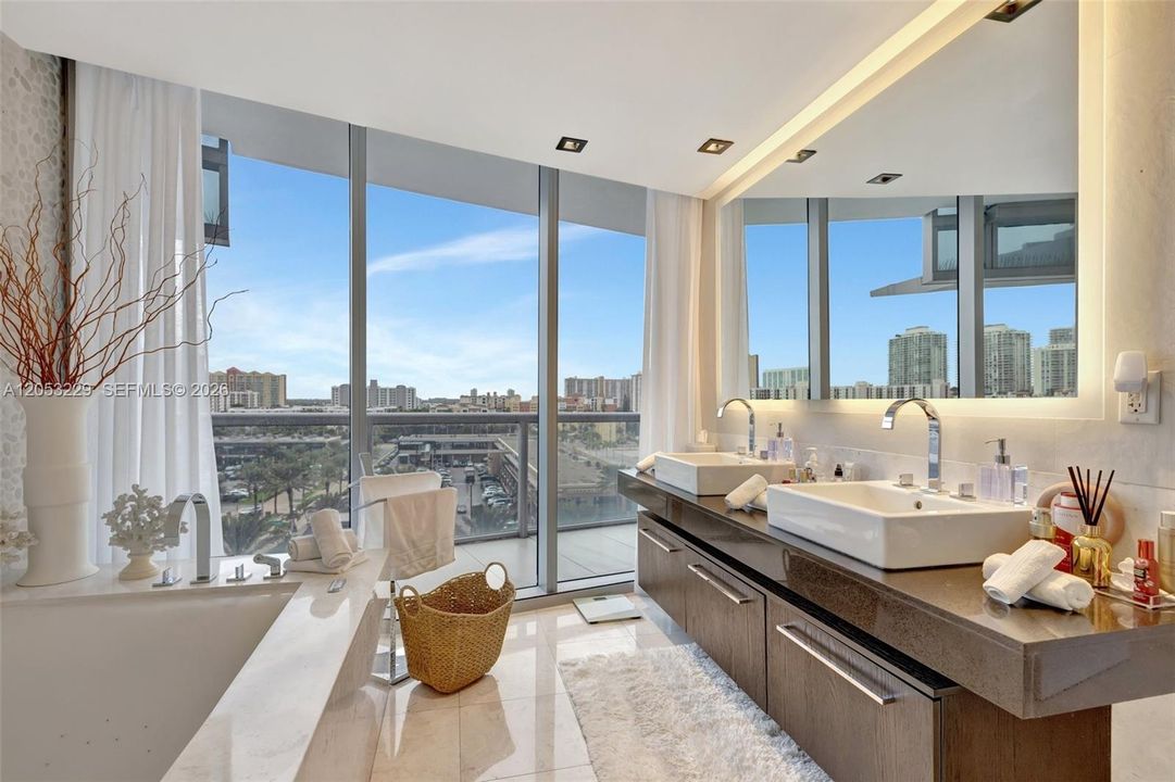 Luxurious Main Bathroom with Dual Sinks and Soaking Tub