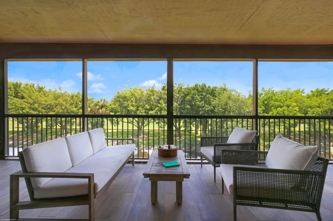 Screened balcony overlooking the water