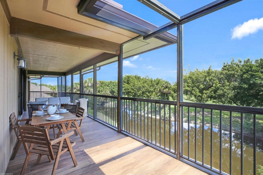 Screened balcony overlooking the water