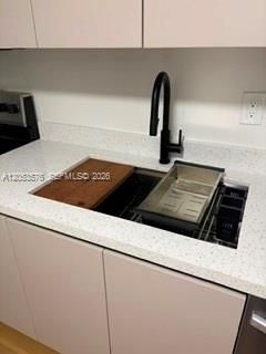 Deep SS sink including built in cutting board and dish rack