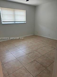 1st guest bedroom, tile flooring