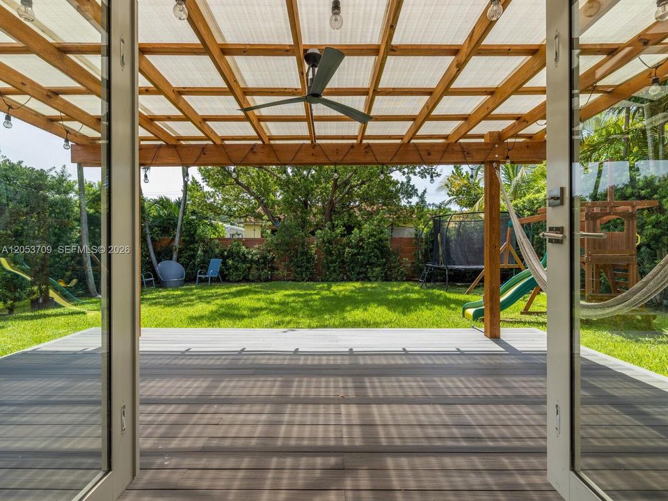 French Doors from Florida Room to Pergola-covered Back Deck