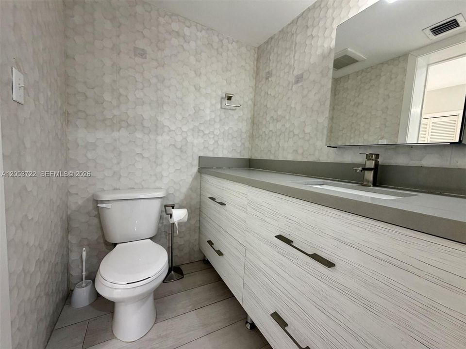 Half Bath Counter and tiled walls