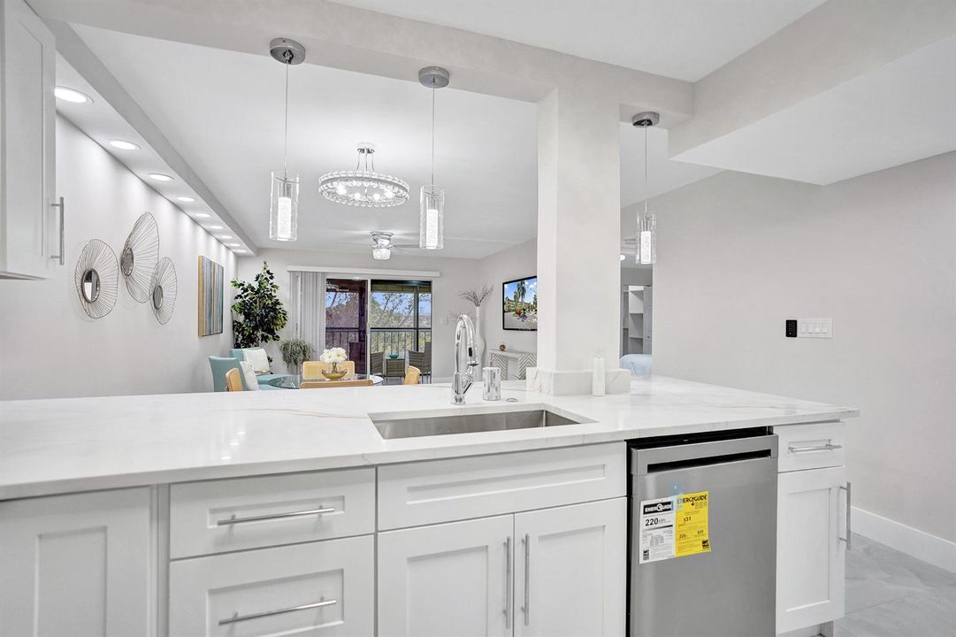 renovated condo kitchen with large stain