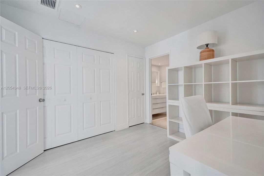 Office located between Primary Bedroom and Bathroom