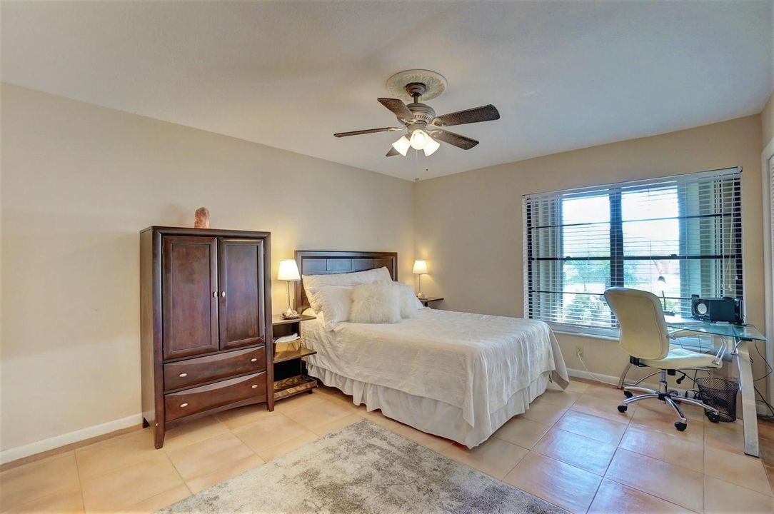 Huge guest bedroom offers lots of space.