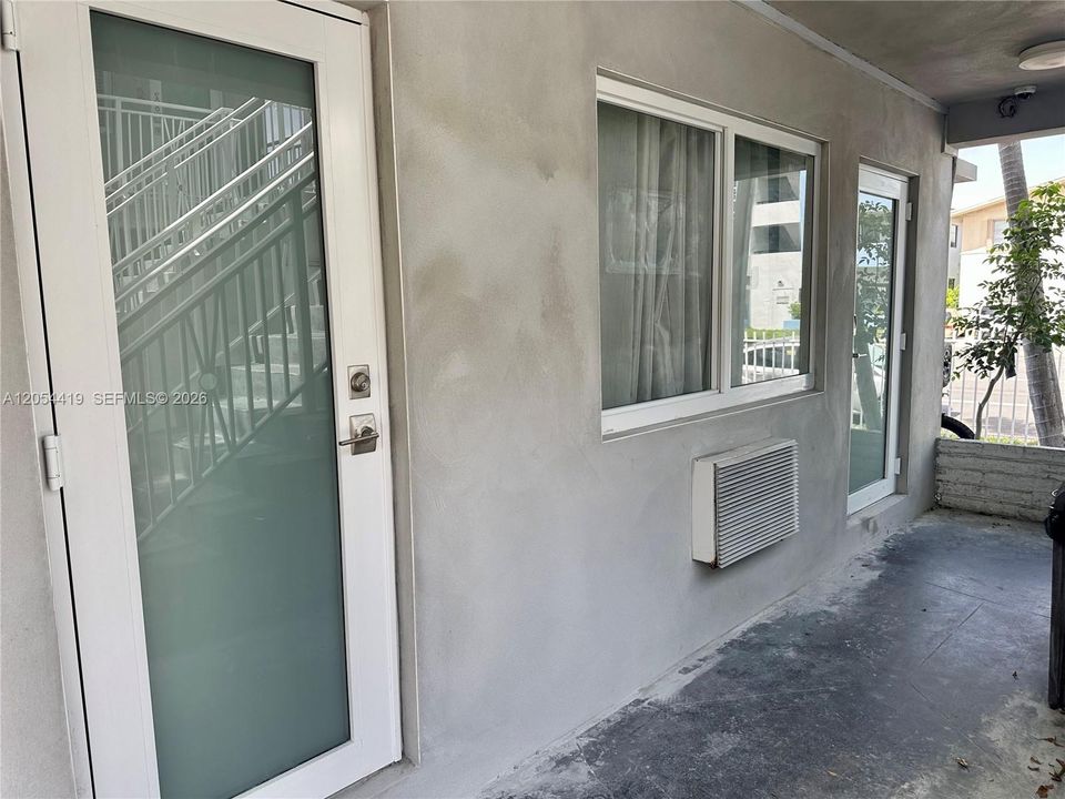 KITCHEN AND MAIN ENTRANCE