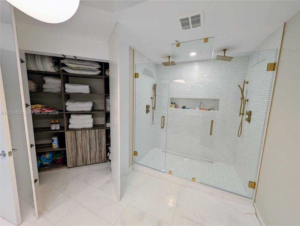 Master bathroom shower and added closet